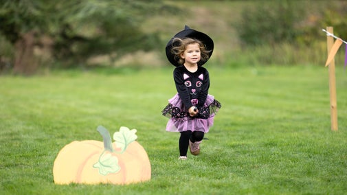 Child exploring the Halloween trail at Ightham Mote, Kent